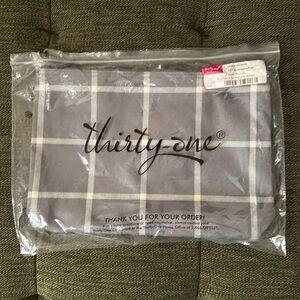 Thirty-one zipper pouch in Windowpane Plaid.